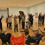 Thumbnail of group taking lesson from teacher