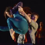 Thumbnail of One dancer lifting another into the air
