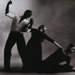 Thumbnail of Three dancers touching each other posed in a row