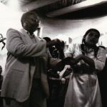 Thumbnail of People gathered together in a room