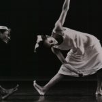 Thumbnail of Three dancers leaned over their legs with arms out to the side