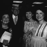 Thumbnail of Four people smiling