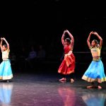 Thumbnail of Three dancers in colorful dresses