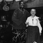 Thumbnail of Two people smiling