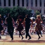 Thumbnail of Group of dancers from behind outside