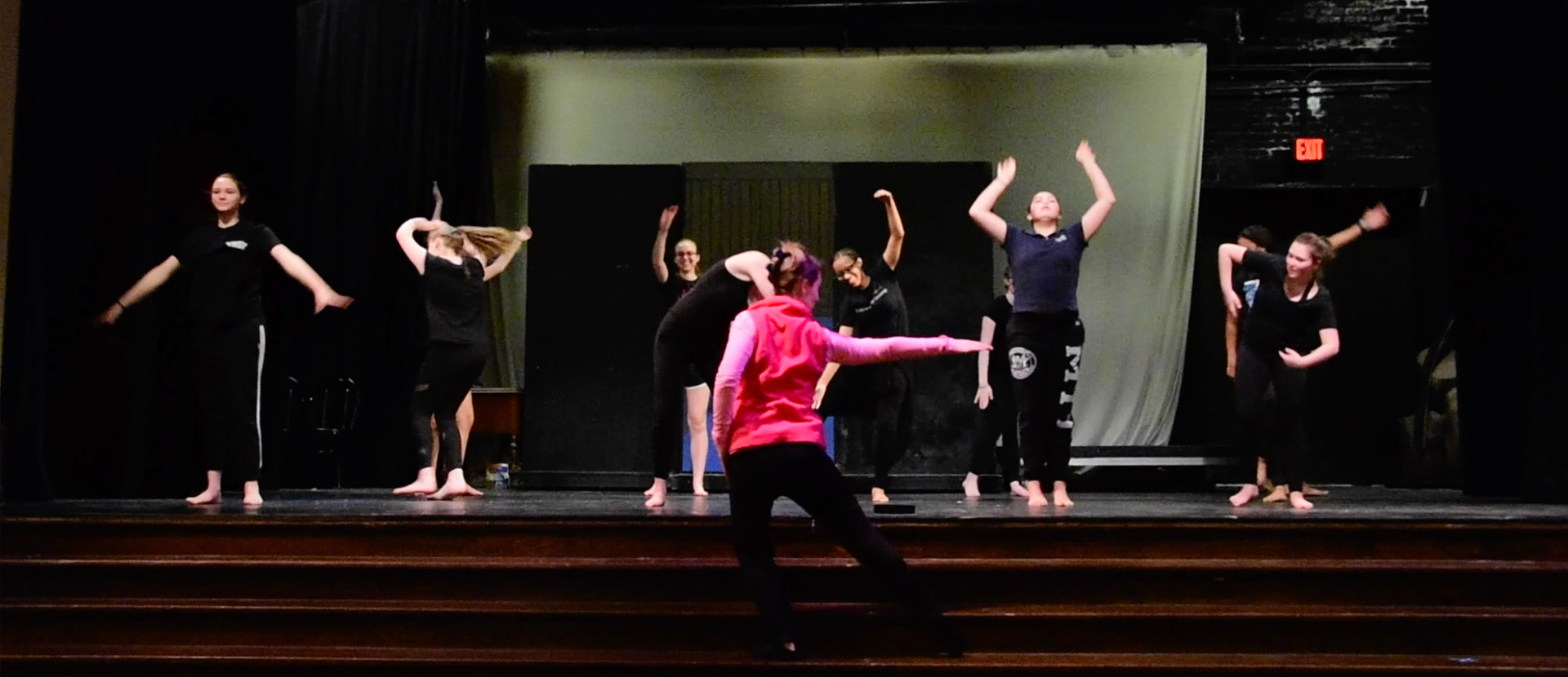 woman teaching students