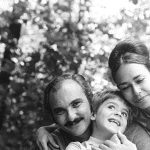 Thumbnail of man woman and child hugging