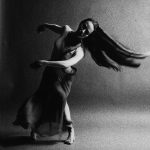 Thumbnail of Dancer turning with long hair and skirt