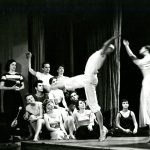 Thumbnail of two dancers group sitting man with drum stick