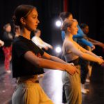 Thumbnail of group of dancers rehearsing