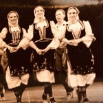 Thumbnail of Three women in slavic dress holding hands dancing