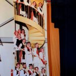 Thumbnail of group of people posing outside in snow smiling