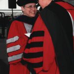 Thumbnail of Woman in cap and gown receiving degree