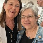 Thumbnail of two women smiling and posing