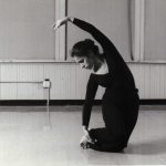 Thumbnail of Woman on knees reachin with arm to left