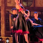 Thumbnail of woman in black dress