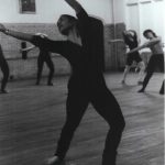 Thumbnail of dance teacher arms over head and lt