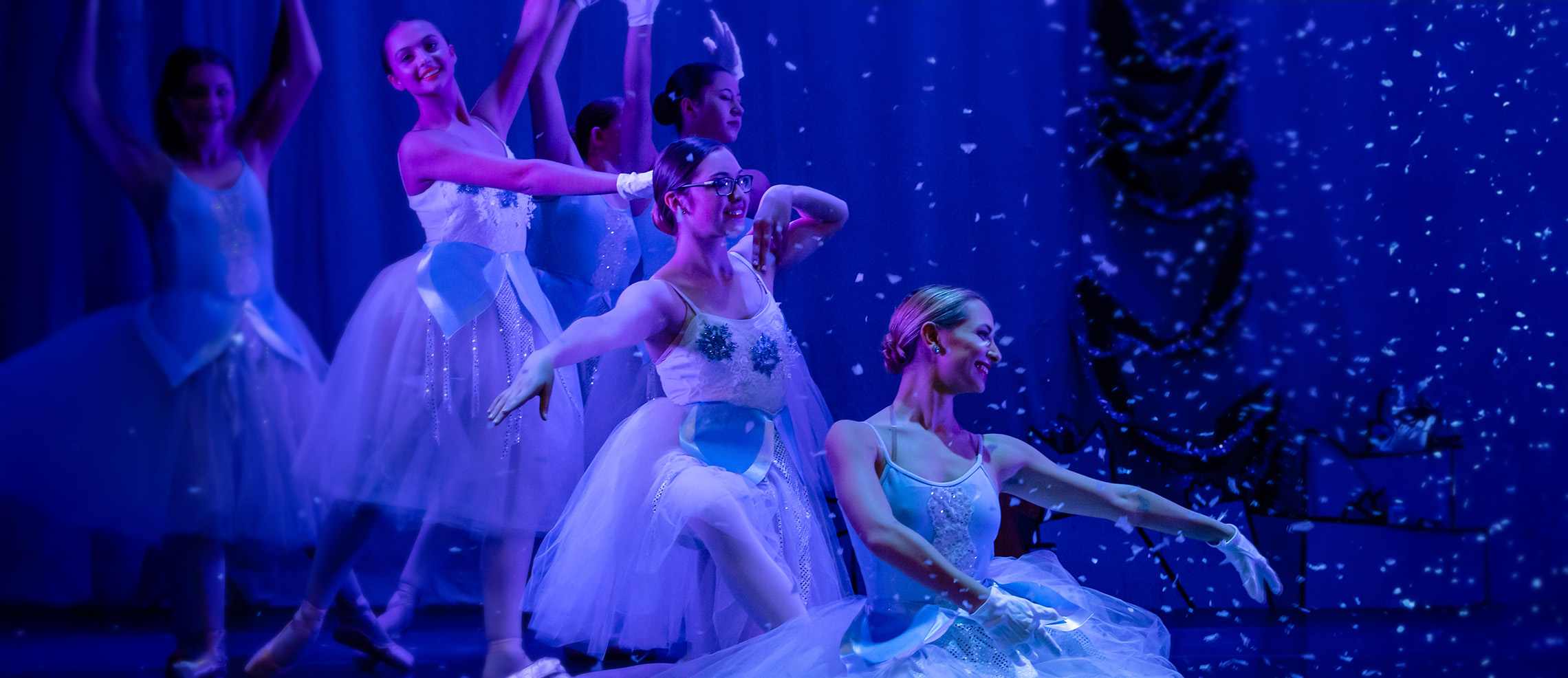 dancers with blue lightin