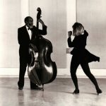 Thumbnail of Bass player and dancer on stage