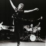 Thumbnail of Woman in sparkling shirt tap dancing