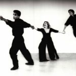 Thumbnail of Man, woman and man holding hands
