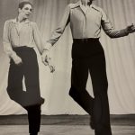 Thumbnail of man and woman tap dancing in long sleeved shirts and black pants